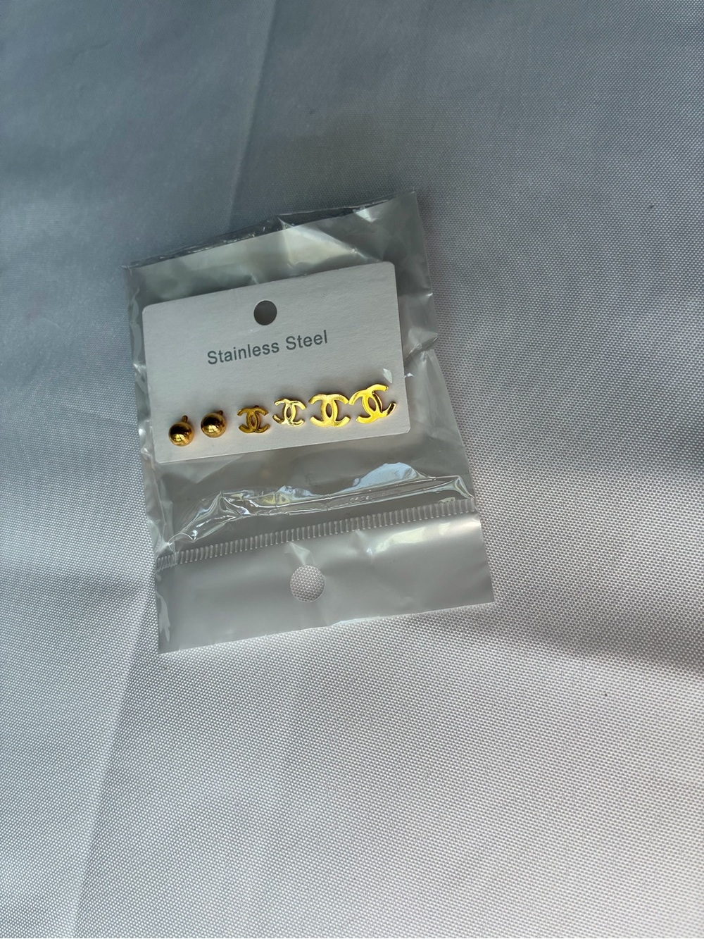 Gold Tone Stainless Steel Logo Stud Earring Set - Picture 2 of 4